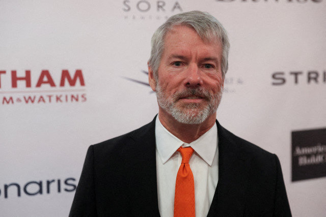 FILE PHOTO: Michael Saylor, executive chairman and co-founder of Strategy, poses for a photograph during the "Bitcoin Treasuries Unconference" cryptocurrency event, in New York City, New York, U.S., September 17, 2025. REUTERS/Joy Malone/File Photo
