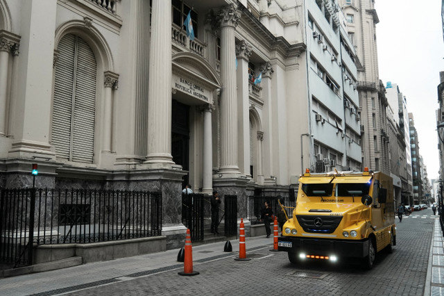 An armored truck drives past Argentina's Central Bank in Buenos Aires, Argentina, on April 11, 2025. REUTERS/Irina Dambrauskas