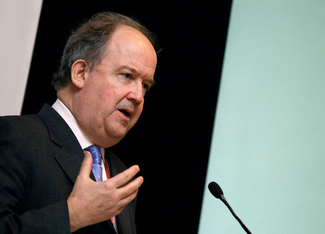 FILE PHOTO: Chief Financial Officer of Rio Tinto, Guy Elliott, speaks during Russian Business Week 2011 at the London School of Economics in London on February 18, 2011. REUTERS/Stefan Wermuth/File Photo