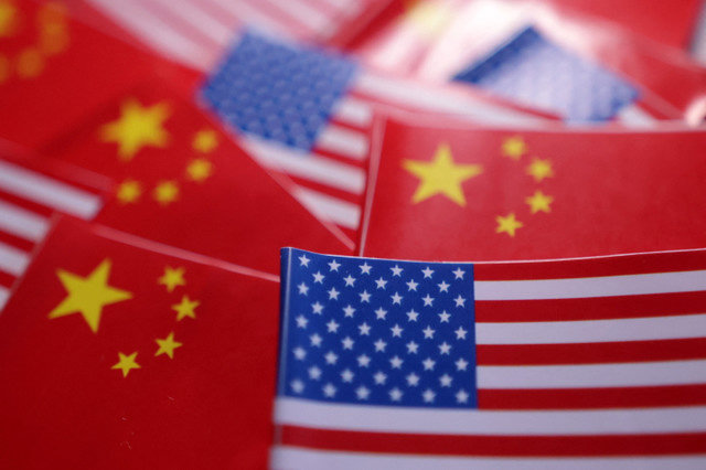 U.S. and Chinese flags are depicted in this illustration captured on March 20, 2025. REUTERS/Dado Ruvic/Illustration