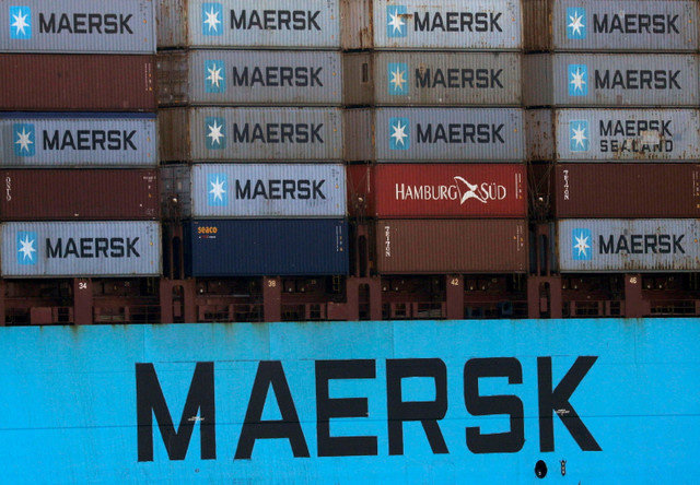 FILE PHOTO: Shipping containers are transported on a Maersk Line vessel through the Suez Canal in Ismailia, Egypt July 7, 2021. Picture taken July 7, 2021. REUTERS/Amr Abdallah Dalsh/File Photo
