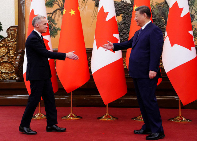 Canadian Prime Minister Mark Carney meets with President of China Xi Jinping at the Great Hall of the People in Beijing, China on Friday, Jan. 16, 2026. Sean Kilpatrick/Pool via REUTERS TPX IMAGES OF THE DAY
