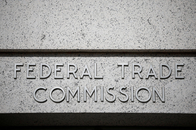 FILE PHOTO: A view of signage at the Federal Trade Commission (FTC) headquarters in Washington, D.C., U.S., November 24, 2024. REUTERS/Benoit Tessier/File Photo