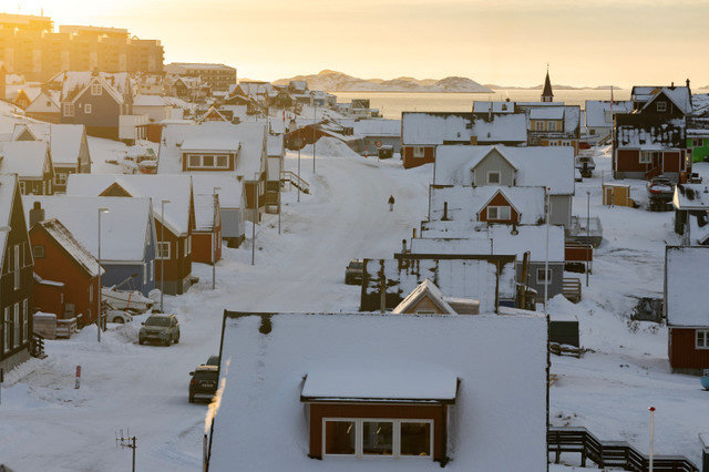 A person walks along a street on the day of the meeting between top U.S. officials and the foreign ministers of Denmark and Greenland, in Nuuk, Greenland, January 14, 2026. REUTERS/Marko Djurica/File Photo