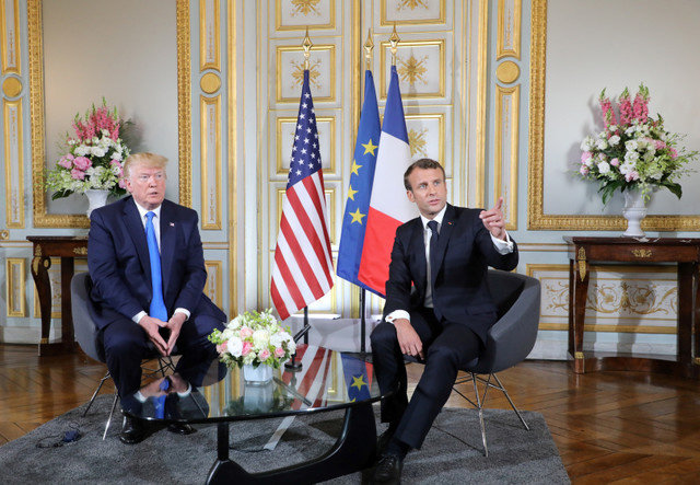 U.S. President Donald Trump and French President Emmanuel Macron speak during a meeting at the Prefecture of Caen, Normandy, France, on June 6, 2019, on the sidelines of D-Day commemorations marking the 75th anniversary of the World War II Allied landings in Normandy. Ludovic Marin/Pool via REUTERS