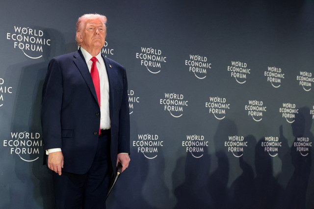 U.S. President Donald Trump attends a reception with business leaders during the 56th annual World Economic Forum (WEF) in Davos, Switzerland, January 21, 2026. REUTERS/Jonathan Ernst
