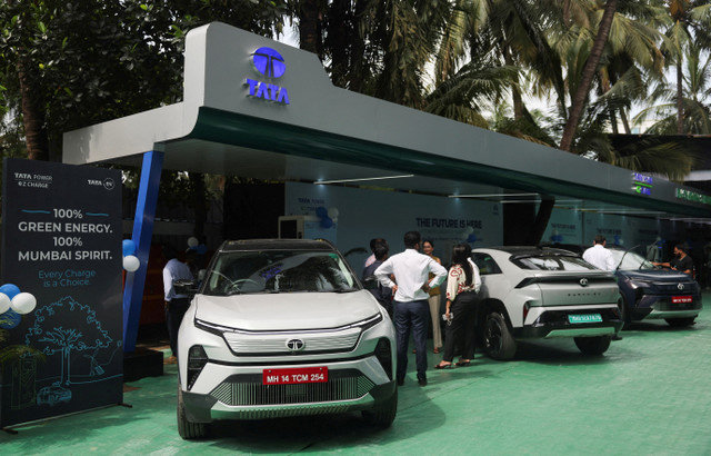 FILE PHOTO: Tata electric vehicles are parked as they recharge at a TATA EV charging station in Mumbai, India, September 9, 2025. REUTERS/Francis Mascarenhas/File Photo