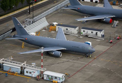 Boeing Reports Profit on Asset Sale While Losses Persist