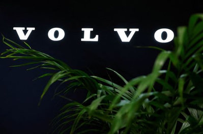 Volvo cuts dividend, signals caution