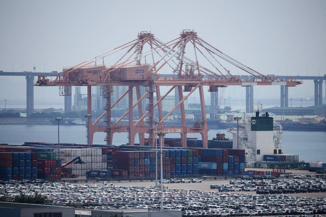 FILE PHOTO: KIA Motors' vehicles are parked to be exported, at a port in Pyeongtaek, South Korea, July 31, 2025. REUTERS/Kim Hong-Ji/File Photo