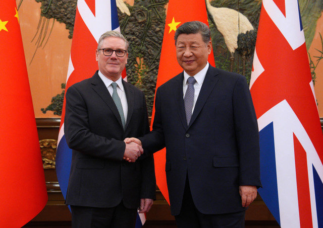 2026年1月29日、中国の北京を訪問中のイギリスのキア・スターマー首相は、双方向会談を前に中国の習近平国家主席と握手を交わした。Carl Court/Pool via REUTERS