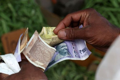 Rupee heads for record low open past 92-per-dollar level