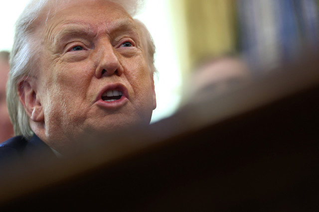 2026年1月30日、アメリカ、ワシントンD.C.のホワイトハウスにある大統領執務室で話すドナルド・トランプ米大統領。REUTERS/Kevin Lamarque