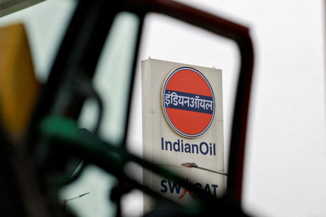 FILE PHOTO: The logo of Indian Oil is pictured outside a fuel station in Baghola, Haryana, India, June 4, 2025. REUTERS/Priyanshu Singh/File Photo