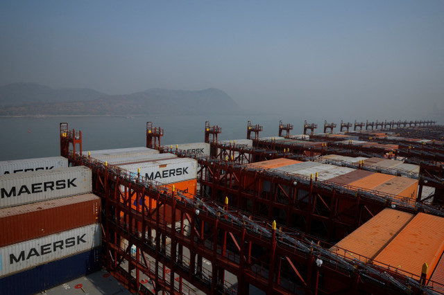 Maersk shipping containers are stored aboard the 'Albert Maersk' at the APM Terminals in Navi Mumbai, India, February 28, 2025. REUTERS/Francis Mascarenhas