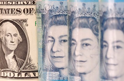 Pound and Yields Fall as Bank of England Signals Rate Cut