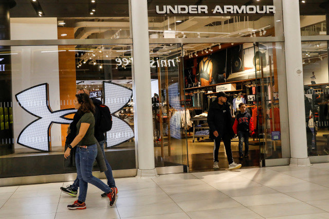 Customers exit an Under Armour store in New York City, U.S., November 4, 2019. REUTERS/Brendan McDermid