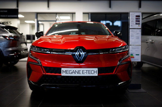 A Renault Megane E-Tech electric car is displayed at a showroom of a car dealer in Reze near Nantes, France, November 13, 2023. REUTERS/Stephane Mahe