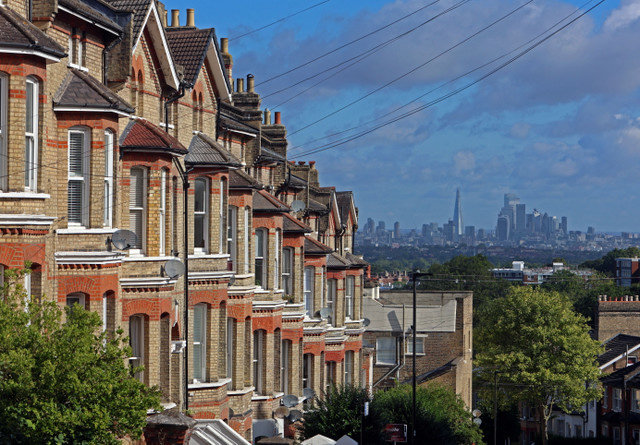 Buildings in the City of London are seen alongside Victorian residential housing in South London, Britain, August 1, 2023. REUTERS/ Susannah Ireland