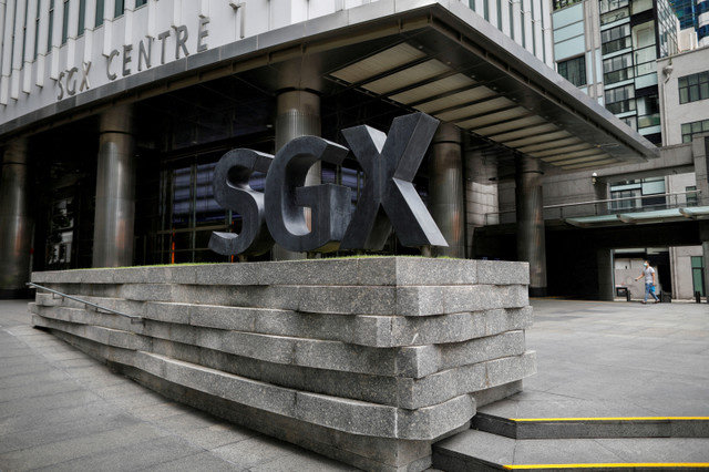 The logo of the Singapore Exchange (SGX) is seen in the central business district of Singapore on April 7, 2020. REUTERS/Edgar Su/File Photo/File Photo