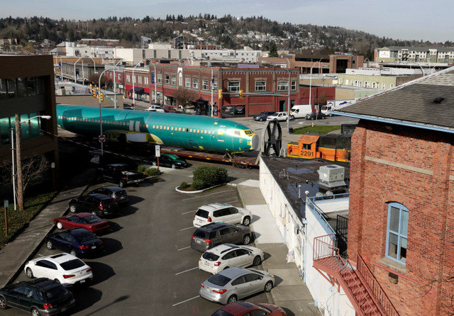 FILE PHOTO: Boeing 737 fuselages are delivered by train to a Boeing manufacturing site in Renton, Washington, February 26, 2014. REUTERS/Jason Redmond/File Photo