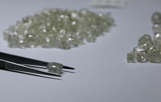 FILE PHOTO: Diamonds are displayed during a visit to the De Beers Global Sightholder Sales (GSS) in Gaborone, Botswana, on November 24, 2015. REUTERS/Siphiwe Sibeko/File Photo
