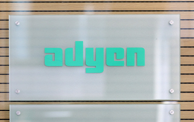 The Adyen logo is displayed at the reception desk of the company's headquarters in Amsterdam, Netherlands, on August 24, 2018. REUTERS/Eva Plevier