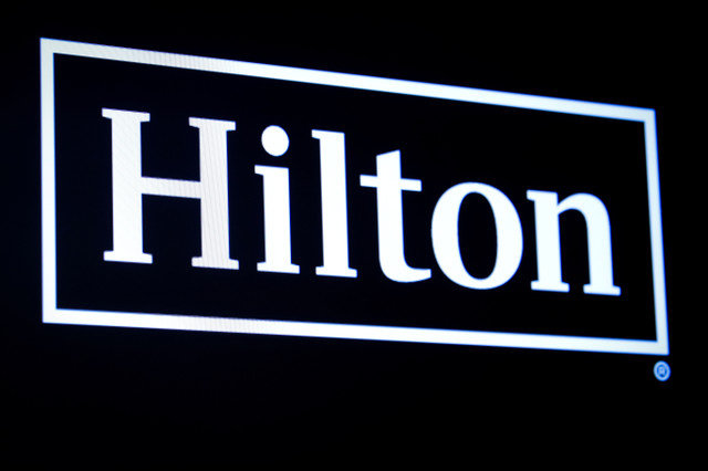 The Hilton logo is displayed on a screen on the floor of the New York Stock Exchange (NYSE) in New York, U.S., May 29, 2019. REUTERS/Brendan McDermid