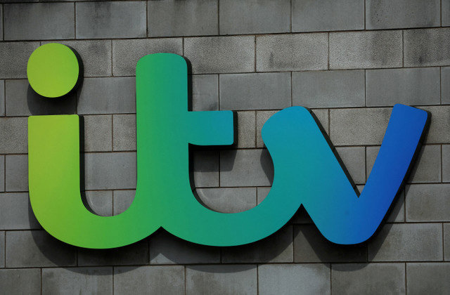 FILE PHOTO: Signage is seen on the side of an ITV office building at Media City in Manchester, Britain, May 13, 2024. REUTERS/Phil Noble/File Photo