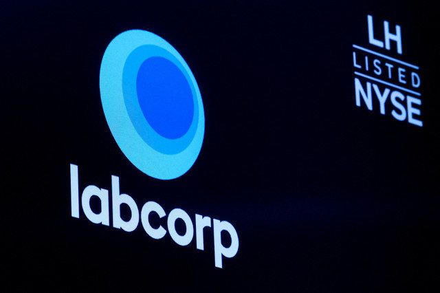 The logo for Labcorp, Laboratory Corporation of America, a life sciences company is displayed on a screen on the floor of the New York Stock Exchange (NYSE) in New York City, U.S., June 22, 2023. REUTERS/Brendan McDermid