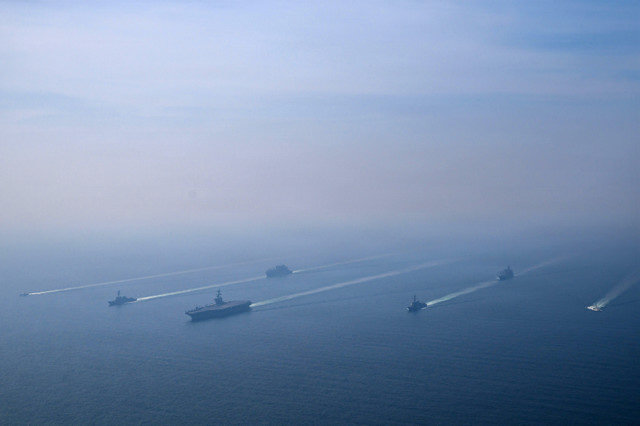 The U.S. Navy's Nimitz-class aircraft carrier USS Abraham Lincoln leads its strike group during a photo exercise in the Arabian Sea, February 6, 2026. U.S. Navy/Mass Communication Specialist 1st Class Jesse Monford/Handout via REUTERS