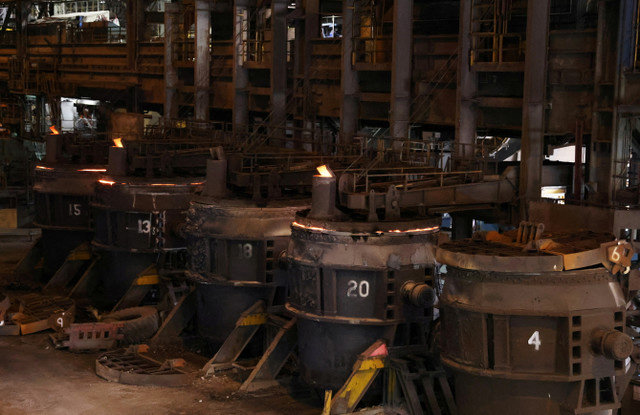A row of storage containers at the BlueScope steelworks, Port Kembla, Australia February 9, 2024. REUTERS/Lewis Jackson
