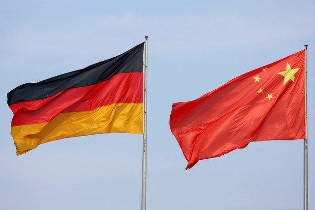The flags of Germany and China are seen ahead of a meeting between German Chancellor Olaf Scholz and Chinese Premier Li Qiang in Berlin, Germany, June 19, 2023. REUTERS/Fabrizio Bensch/File Photo