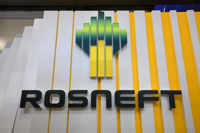 A board displays the logo of Russian oil producer Rosneft at the St. Petersburg International Economic Forum (SPIEF) in Saint Petersburg, Russia, on June 5, 2024. REUTERS/Anton Vaganov