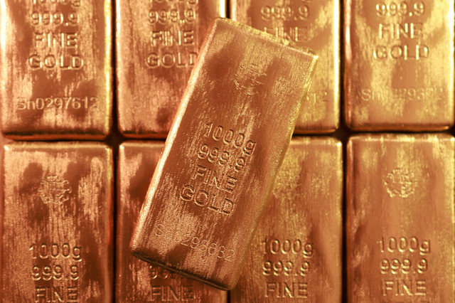 Gold imitations are seen in this illustration picture taken February 20, 2026. REUTERS/Dado Ruvic/Illustration