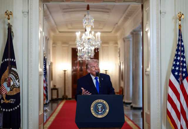U.S. President Donald Trump speaks during an event to honor "Angel Families" who have lost family members to crimes committed by people in the country illegally, at the White House in Washington, D.C., U.S., February 23, 2026. REUTERS/Evelyn Hockstein