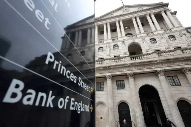 A street sign points toward the Bank of England in London, Britain. REUTERS/Toby Melville/File Photo