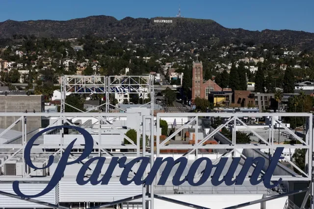 An aerial drone shot captures the Paramount logo positioned before the iconic Hollywood sign in Los Angeles, California, dated December 2025. REUTERS/Daniel Cole