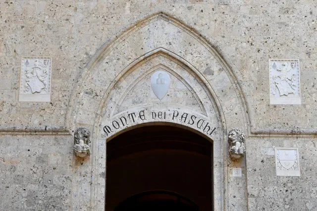 The main entrance of the Monte dei Paschi di Siena headquarters in Siena, Italy, which is currently undergoing a corporate merger process. REUTERS/Jennifer Lorenzini/File Photo