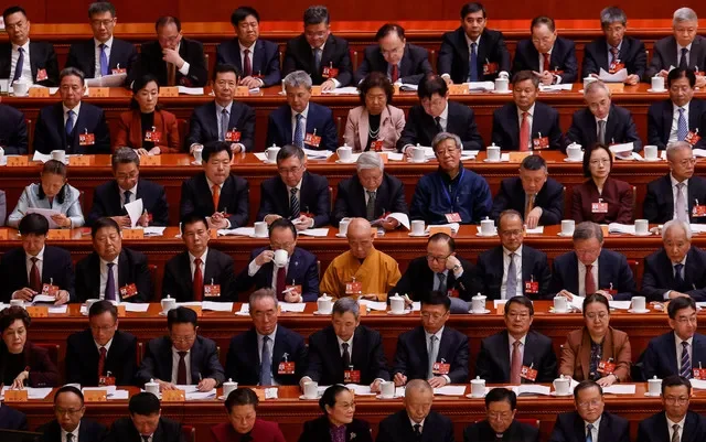 Delegates attend the opening session of the Chinese People's Political Consultative Conference (CPPCC), at the Great Hall of the People in Beijing, China March 4, 2026. REUTERS/Maxim Shemetov