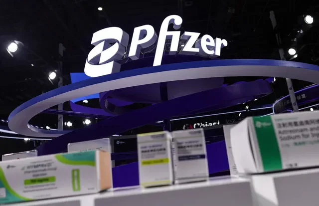 The Pfizer corporate logo is displayed alongside various medical products at the company's exhibition space during the 8th China International Import Expo held in Shanghai. REUTERS/Maxim Shemetov