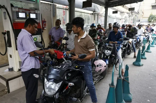 A man refuels his motorcycle at a fuel station in Dhaka, Bangladesh, amid supply concerns on March 6, 2026. REUTERS/Mohammad Ponir Hossain