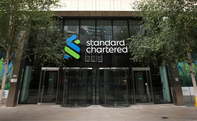 The Standard Chartered corporate logo is visible at the bank's London headquarters. REUTERS/Peter Nicholls