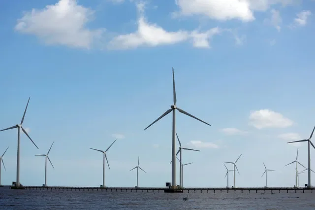 Wind turbines at a power-generation facility in the Bac Lieu province of Vietnam are shown in this 2017 file photo. REUTERS/Kham