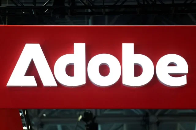 The Adobe logo is pictured at the National Retail Federation's Retail's Big Show in New York City, January 2026. REUTERS/Kylie Cooper/File Photo