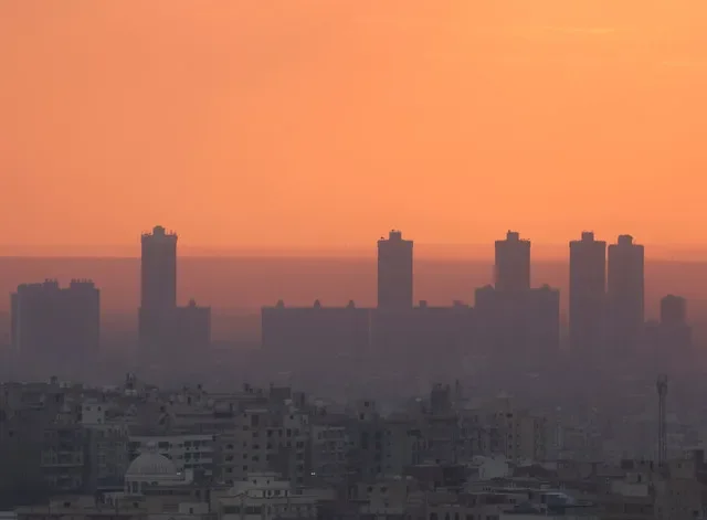 A view of the Cairo skyline during a period of cold, foggy weather at sunset, Egypt. REUTERS/Amr Abdallah Dalsh/File Photo