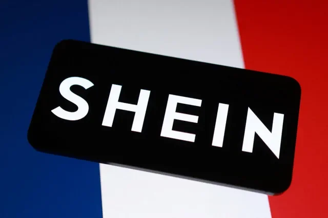 An illustration featuring the Shein logo alongside the national flag of France, captured in November 2025. REUTERS/Dado Ruvic/Illustration