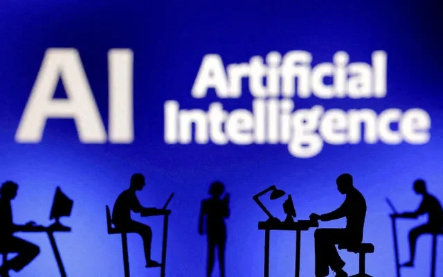 Figurinas com computadores e smartphones são vistas em frente às palavras "Artificial Intelligence AI" nesta ilustração criada em 19 de fevereiro de 2024. REUTERS/Dado Ruvic/Ilustração/Foto de Arquivo