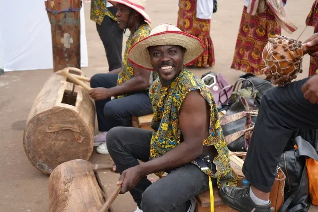 A local musician performs during the arrival of trade ministers and diplomats at the WTO conference in Yaounde. REUTERS/Olivia Le Poidevin