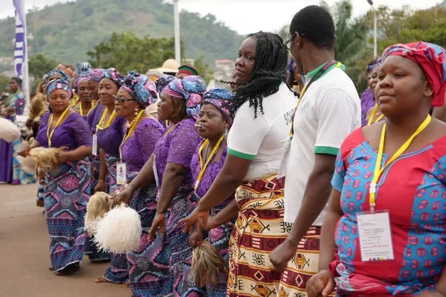 Cultural performers welcome international delegates to the WTO's 14th ministerial conference in the capital of Cameroon. REUTERS/Olivia Le Poidevin
